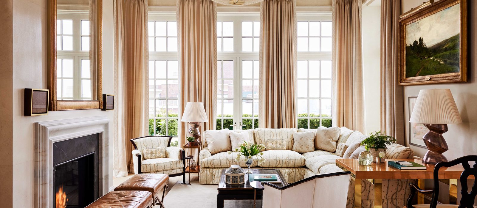 Luxury interior - warm living room with tall windows